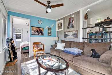 This lovely home on a one and a half lot provides ample privacy on Lake Tansi Village Country Club in Tennessee - for sale on GolfHomes.com, golf home, golf lot