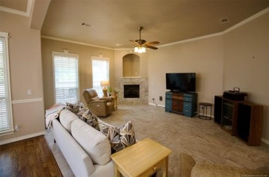 Located in the gated Magnolia Gardens community at Battle Creek on Battle Creek Golf Course in Oklahoma - for sale on GolfHomes.com, golf home, golf lot