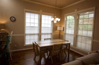 Located in the gated Magnolia Gardens community at Battle Creek on Battle Creek Golf Course in Oklahoma - for sale on GolfHomes.com, golf home, golf lot