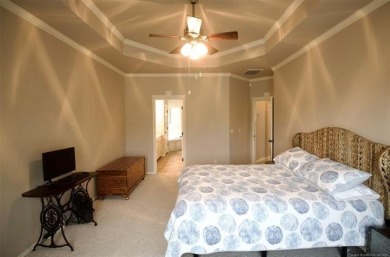Located in the gated Magnolia Gardens community at Battle Creek on Battle Creek Golf Course in Oklahoma - for sale on GolfHomes.com, golf home, golf lot