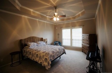 Located in the gated Magnolia Gardens community at Battle Creek on Battle Creek Golf Course in Oklahoma - for sale on GolfHomes.com, golf home, golf lot