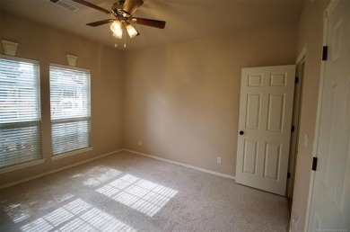 Located in the gated Magnolia Gardens community at Battle Creek on Battle Creek Golf Course in Oklahoma - for sale on GolfHomes.com, golf home, golf lot
