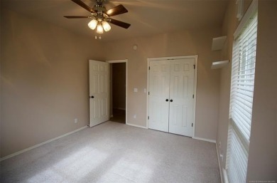 Located in the gated Magnolia Gardens community at Battle Creek on Battle Creek Golf Course in Oklahoma - for sale on GolfHomes.com, golf home, golf lot