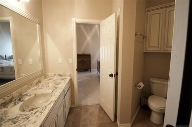 Located in the gated Magnolia Gardens community at Battle Creek on Battle Creek Golf Course in Oklahoma - for sale on GolfHomes.com, golf home, golf lot