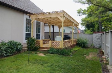 Located in the gated Magnolia Gardens community at Battle Creek on Battle Creek Golf Course in Oklahoma - for sale on GolfHomes.com, golf home, golf lot