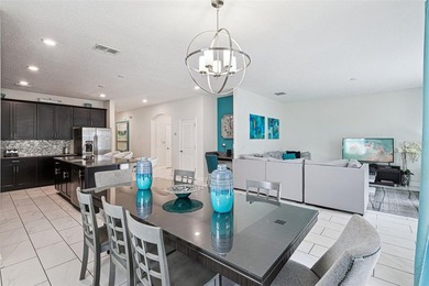 Located in the highly desirable ChampionsGate/The Retreat area on The Oasis Club at Champions Gate in Florida - for sale on GolfHomes.com, golf home, golf lot