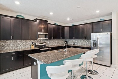 Located in the highly desirable ChampionsGate/The Retreat area on The Oasis Club at Champions Gate in Florida - for sale on GolfHomes.com, golf home, golf lot