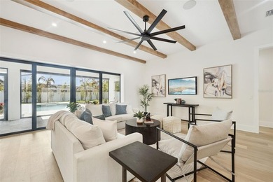 Step into this stunning West-Indies inspired luxury home crafted on Interlachen Country Club in Florida - for sale on GolfHomes.com, golf home, golf lot