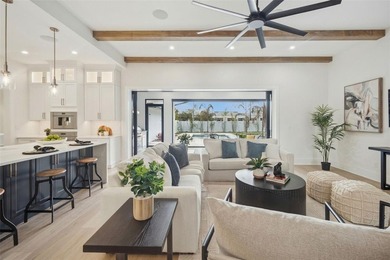 Step into this stunning West-Indies inspired luxury home crafted on Interlachen Country Club in Florida - for sale on GolfHomes.com, golf home, golf lot