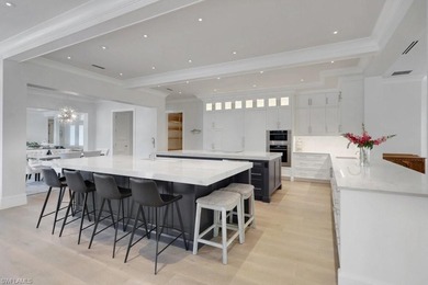 Experience elevated coastal living in this stunning Pelican Bay on Club at Pelican Bay Golf Course in Florida - for sale on GolfHomes.com, golf home, golf lot