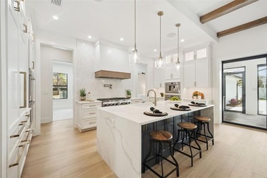 Step into this stunning West-Indies inspired luxury home crafted on Interlachen Country Club in Florida - for sale on GolfHomes.com, golf home, golf lot