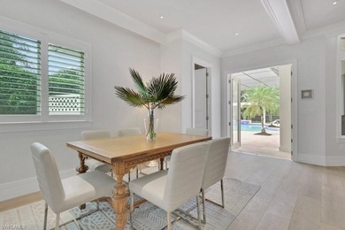 Experience elevated coastal living in this stunning Pelican Bay on Club at Pelican Bay Golf Course in Florida - for sale on GolfHomes.com, golf home, golf lot