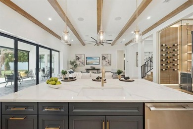 Step into this stunning West-Indies inspired luxury home crafted on Interlachen Country Club in Florida - for sale on GolfHomes.com, golf home, golf lot