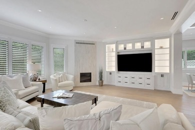 Experience elevated coastal living in this stunning Pelican Bay on Club at Pelican Bay Golf Course in Florida - for sale on GolfHomes.com, golf home, golf lot