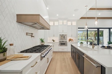 Step into this stunning West-Indies inspired luxury home crafted on Interlachen Country Club in Florida - for sale on GolfHomes.com, golf home, golf lot