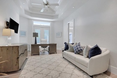 Experience elevated coastal living in this stunning Pelican Bay on Club at Pelican Bay Golf Course in Florida - for sale on GolfHomes.com, golf home, golf lot