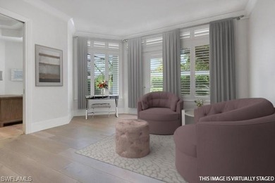 Experience elevated coastal living in this stunning Pelican Bay on Club at Pelican Bay Golf Course in Florida - for sale on GolfHomes.com, golf home, golf lot