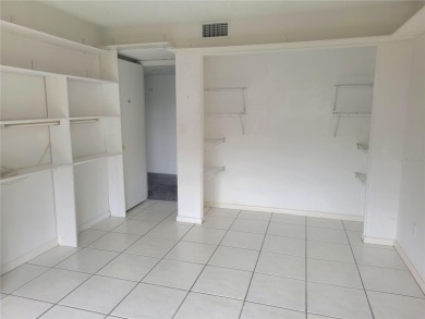 Priced to make it your own! Quiet & rare 3 bedroom, 2 bathroom on Countryside Country Club in Florida - for sale on GolfHomes.com, golf home, golf lot