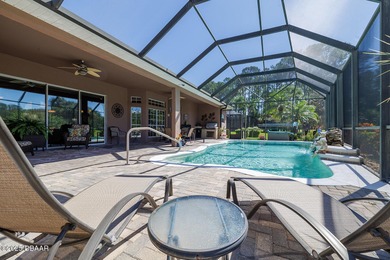 Halifax Plantation pool home. Immaculately maintained. Built by on Halifax Plantation Golf Club in Florida - for sale on GolfHomes.com, golf home, golf lot