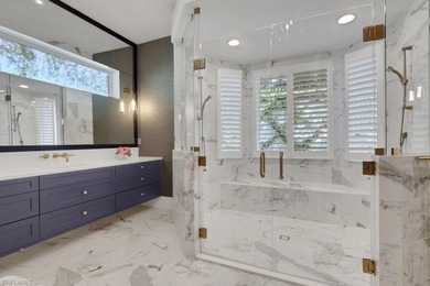 Experience elevated coastal living in this stunning Pelican Bay on Club at Pelican Bay Golf Course in Florida - for sale on GolfHomes.com, golf home, golf lot