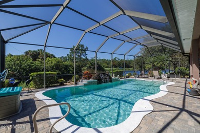 Halifax Plantation pool home. Immaculately maintained. Built by on Halifax Plantation Golf Club in Florida - for sale on GolfHomes.com, golf home, golf lot