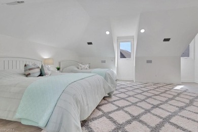 Experience elevated coastal living in this stunning Pelican Bay on Club at Pelican Bay Golf Course in Florida - for sale on GolfHomes.com, golf home, golf lot