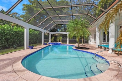 Experience elevated coastal living in this stunning Pelican Bay on Club at Pelican Bay Golf Course in Florida - for sale on GolfHomes.com, golf home, golf lot