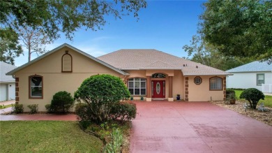 Luxury Living with Golf Course Views and Heated Saltwater Pool! on Harbor Hills Country Club in Florida - for sale on GolfHomes.com, golf home, golf lot