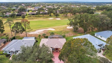 Luxury Living with Golf Course Views and Heated Saltwater Pool! on Harbor Hills Country Club in Florida - for sale on GolfHomes.com, golf home, golf lot