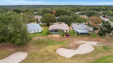 Luxury Living with Golf Course Views and Heated Saltwater Pool! on Harbor Hills Country Club in Florida - for sale on GolfHomes.com, golf home, golf lot