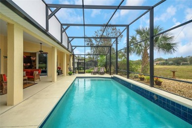 Luxury Living with Golf Course Views and Heated Saltwater Pool! on Harbor Hills Country Club in Florida - for sale on GolfHomes.com, golf home, golf lot