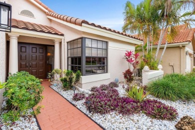 Located in the highly sought-after Boca Woods Country Club, this on Boca Woods Country Club in Florida - for sale on GolfHomes.com, golf home, golf lot