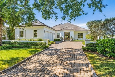 Stunning Orchid Island home with beautiful golf view of the14th on Orchid Island Golf and Beach Club in Florida - for sale on GolfHomes.com, golf home, golf lot