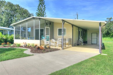 Spacious perimeter lot! This well-maintained home offers an on Barefoot Bay Golf Course in Florida - for sale on GolfHomes.com, golf home, golf lot