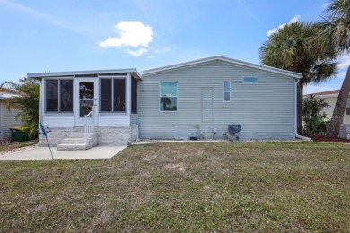 Beautiful and spacious THREE bedroom Palm Harbor built home on Maple Leaf Golf and Country Club in Florida - for sale on GolfHomes.com, golf home, golf lot