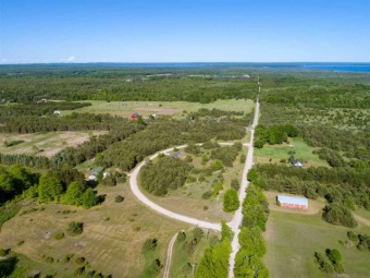 This well planned site condo with underground utilities is on Maple Ridge Golf Club in Michigan - for sale on GolfHomes.com, golf home, golf lot
