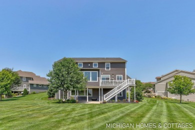 Welcome to 4401 Grand Point, a stunning home nestled on nearly on The Macatwa Legends Golf Course in Michigan - for sale on GolfHomes.com, golf home, golf lot