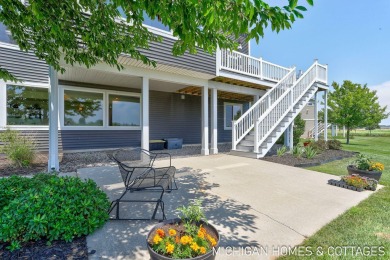 Welcome to 4401 Grand Point, a stunning home nestled on nearly on The Macatwa Legends Golf Course in Michigan - for sale on GolfHomes.com, golf home, golf lot