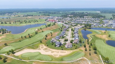 Welcome to 4401 Grand Point, a stunning home nestled on nearly on The Macatwa Legends Golf Course in Michigan - for sale on GolfHomes.com, golf home, golf lot
