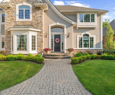 Welcome to this stunning estate in the prestigious, gated on Oakhurst Golf and Country Club in Michigan - for sale on GolfHomes.com, golf home, golf lot