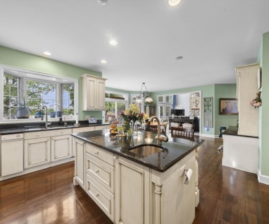 Welcome to this stunning estate in the prestigious, gated on Oakhurst Golf and Country Club in Michigan - for sale on GolfHomes.com, golf home, golf lot
