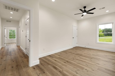 This beautiful home has been designed to put exceptional quality on Woodson Bend Resort in Kentucky - for sale on GolfHomes.com, golf home, golf lot