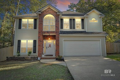 Welcome to this inviting two-story home nestled in the highly on Lake Forest Yacht and Country Club in Alabama - for sale on GolfHomes.com, golf home, golf lot