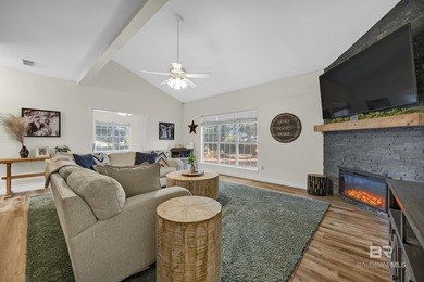 Welcome to this inviting two-story home nestled in the highly on Lake Forest Yacht and Country Club in Alabama - for sale on GolfHomes.com, golf home, golf lot