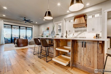 Harmony Club Stunner offering a perfect balance of refined on Harmony Golf Club in Colorado - for sale on GolfHomes.com, golf home, golf lot