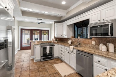 Nestled on a picturesque brick-lined street in the heart of on Palma Ceia Golf and Country Club in Florida - for sale on GolfHomes.com, golf home, golf lot