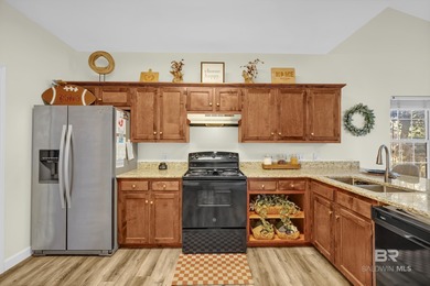 Welcome to this inviting two-story home nestled in the highly on Lake Forest Yacht and Country Club in Alabama - for sale on GolfHomes.com, golf home, golf lot