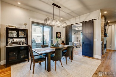 Harmony Club Stunner offering a perfect balance of refined on Harmony Golf Club in Colorado - for sale on GolfHomes.com, golf home, golf lot