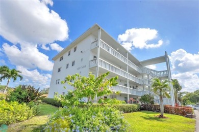 Enjoy South Florida living with this 2Bed/2Bath second floor on Hillsboro Pines Golf in Florida - for sale on GolfHomes.com, golf home, golf lot