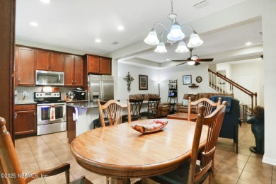 Live where charm meets convenience in this beautiful townhome on Slammer and Squire Golf Course in Florida - for sale on GolfHomes.com, golf home, golf lot
